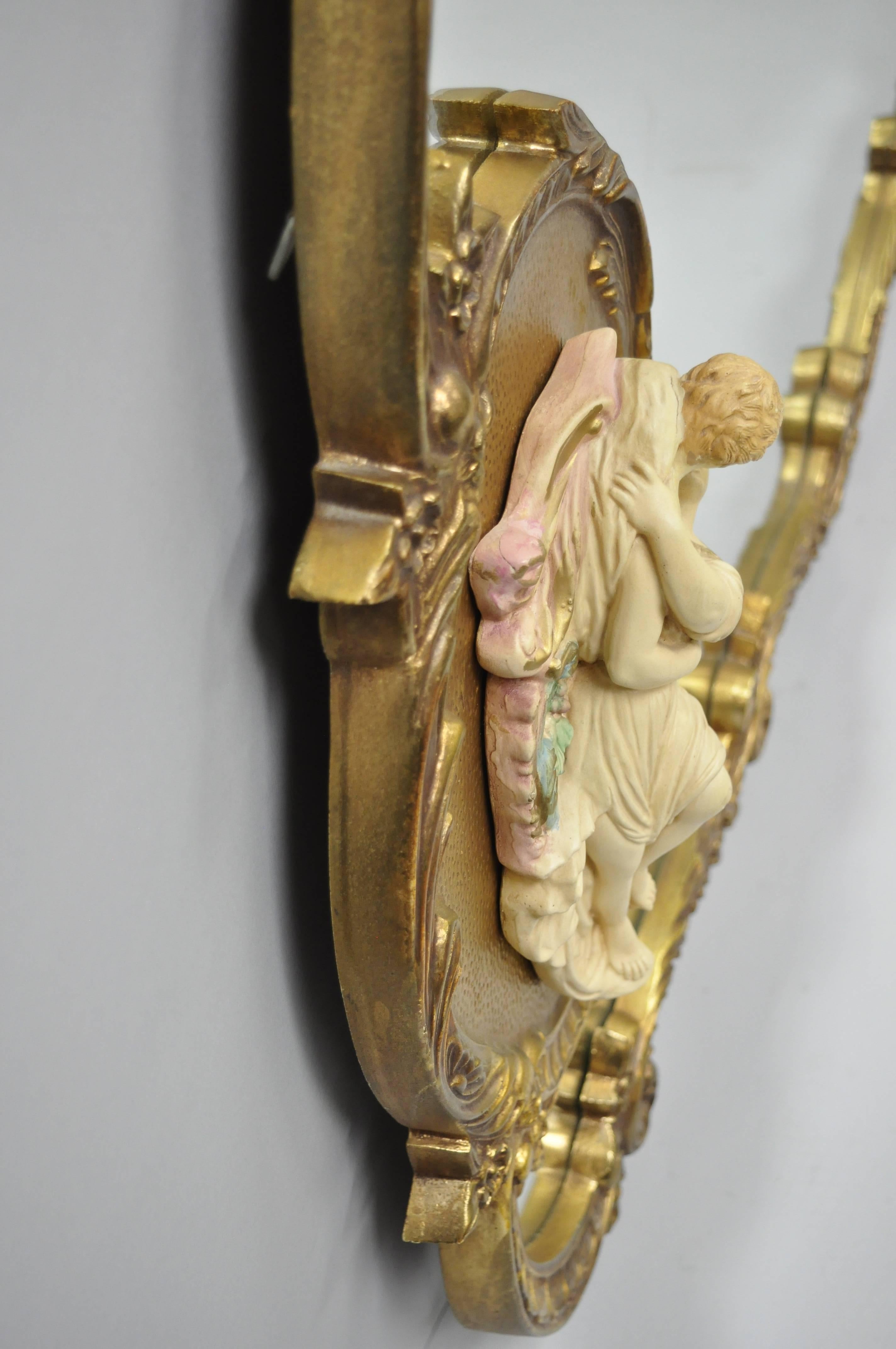 Mid-20th Century Large French Rococo Style Gold Wall Mirror with Bisque Figural Lovers Plaques