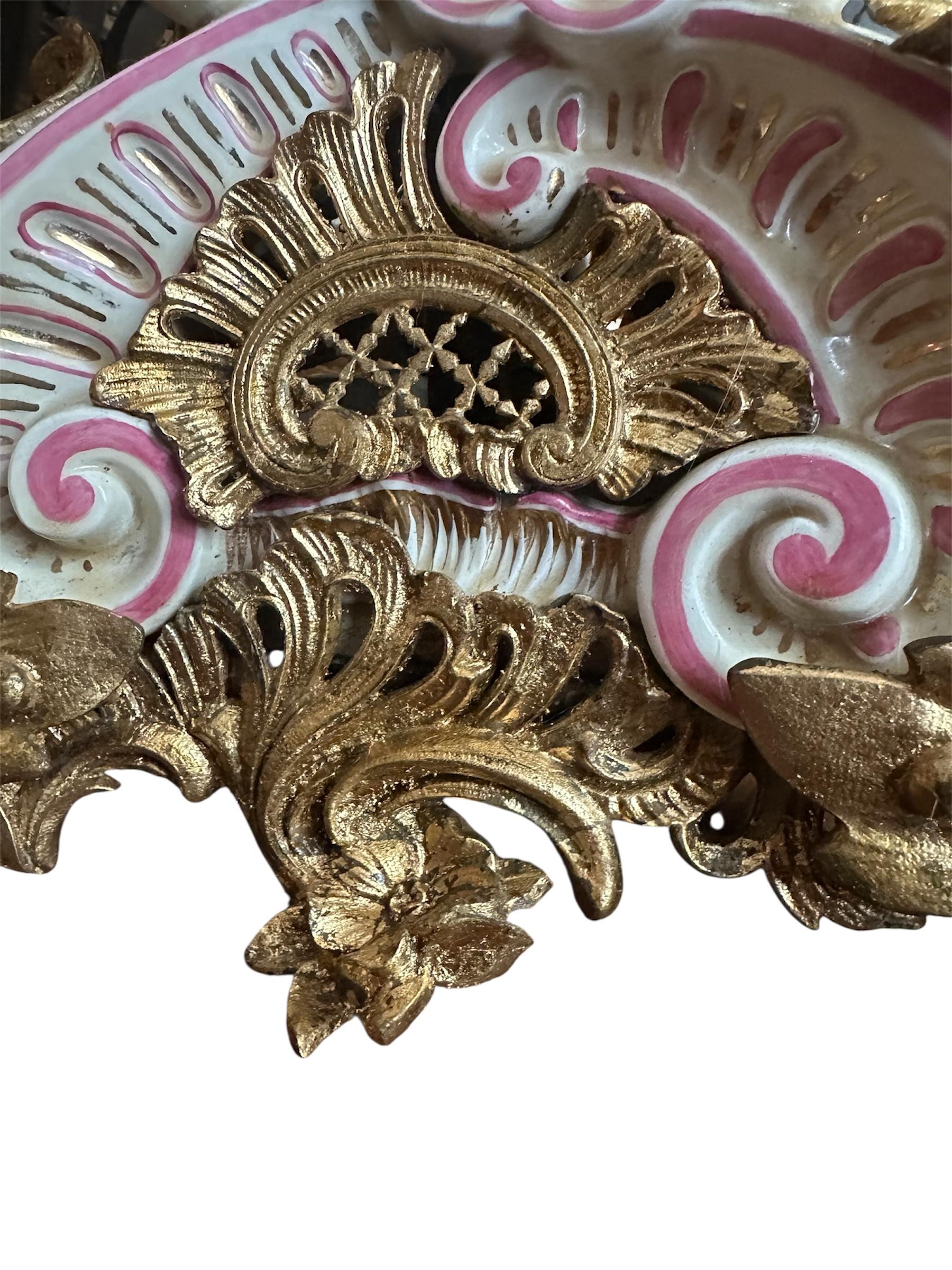Large French Strasbourg 19th Century Faience tall floor candle holder 

19th century French Strasbourg faience floor candle holder in Rococo style. Extremely beautiful and elegant, the torchiere is decorated in a burgundy and gold pattern on a