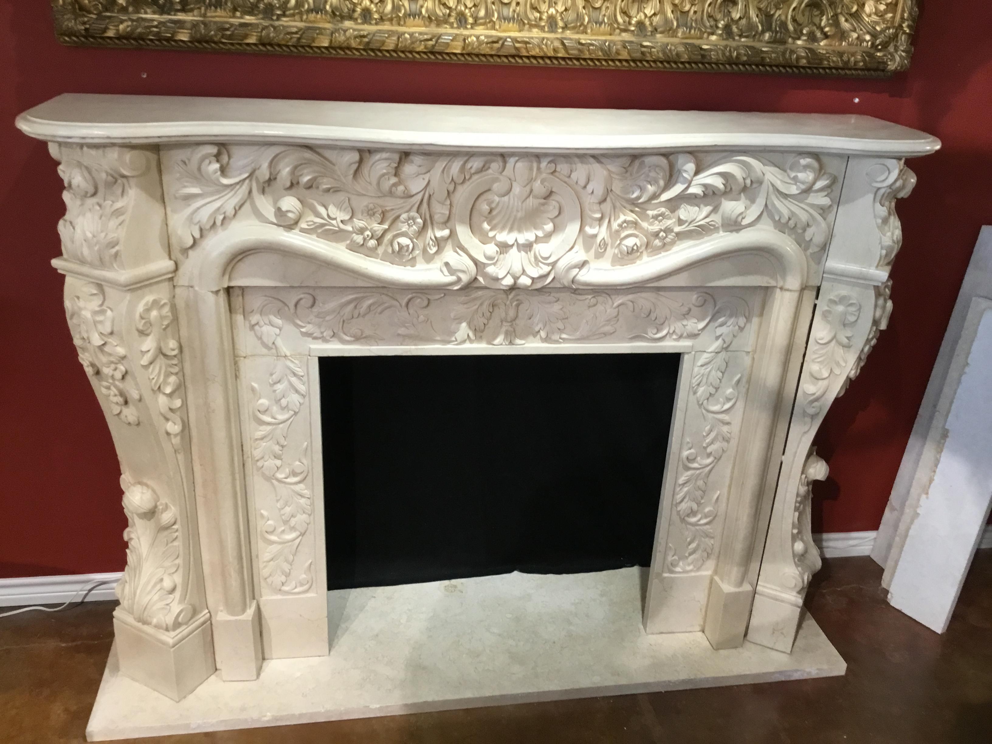 Contemporary Large French Style Cream Marble Mantel, Hand Carved with Floral Designs