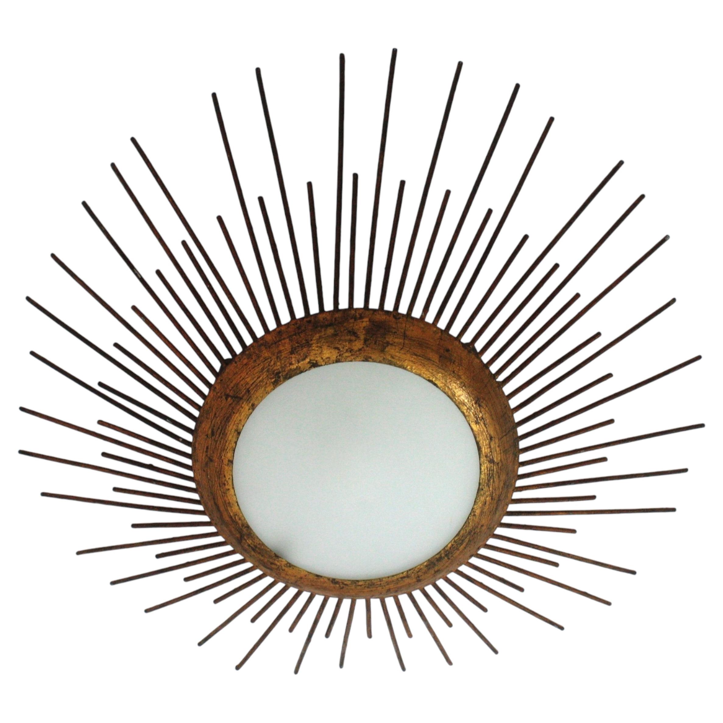Large French Sunburst Nail Design Ceiling Light Fixture in Gilt Iron and Glass For Sale