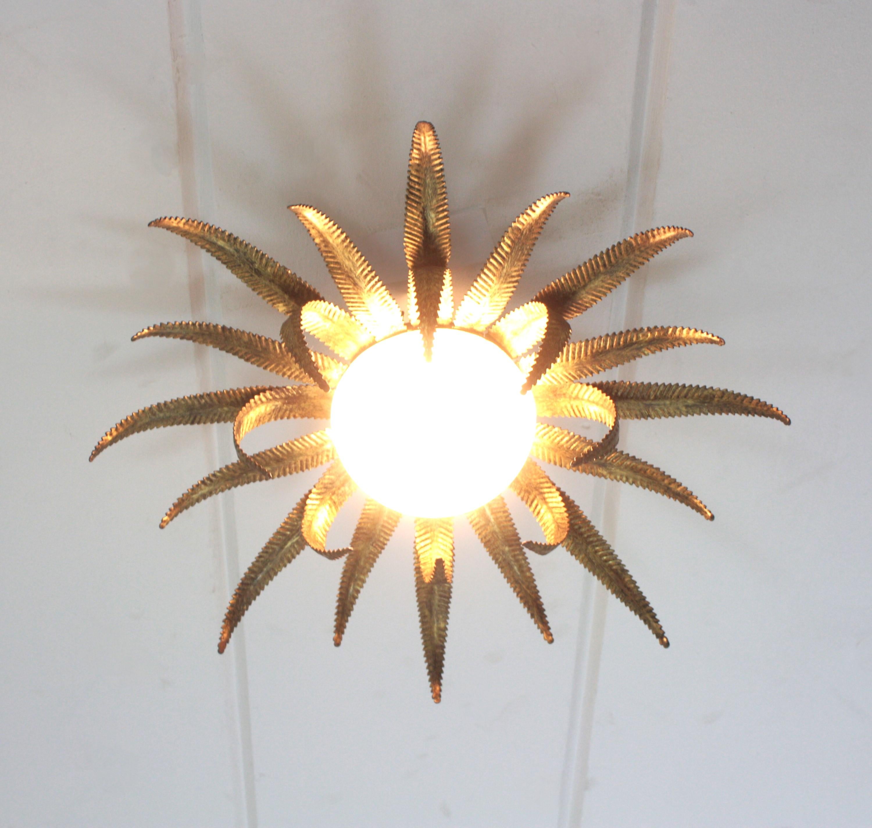 Mid-Century Modern Large French Sunburst Starburst Light Fixture, Gilt Metal and Milk Glass For Sale