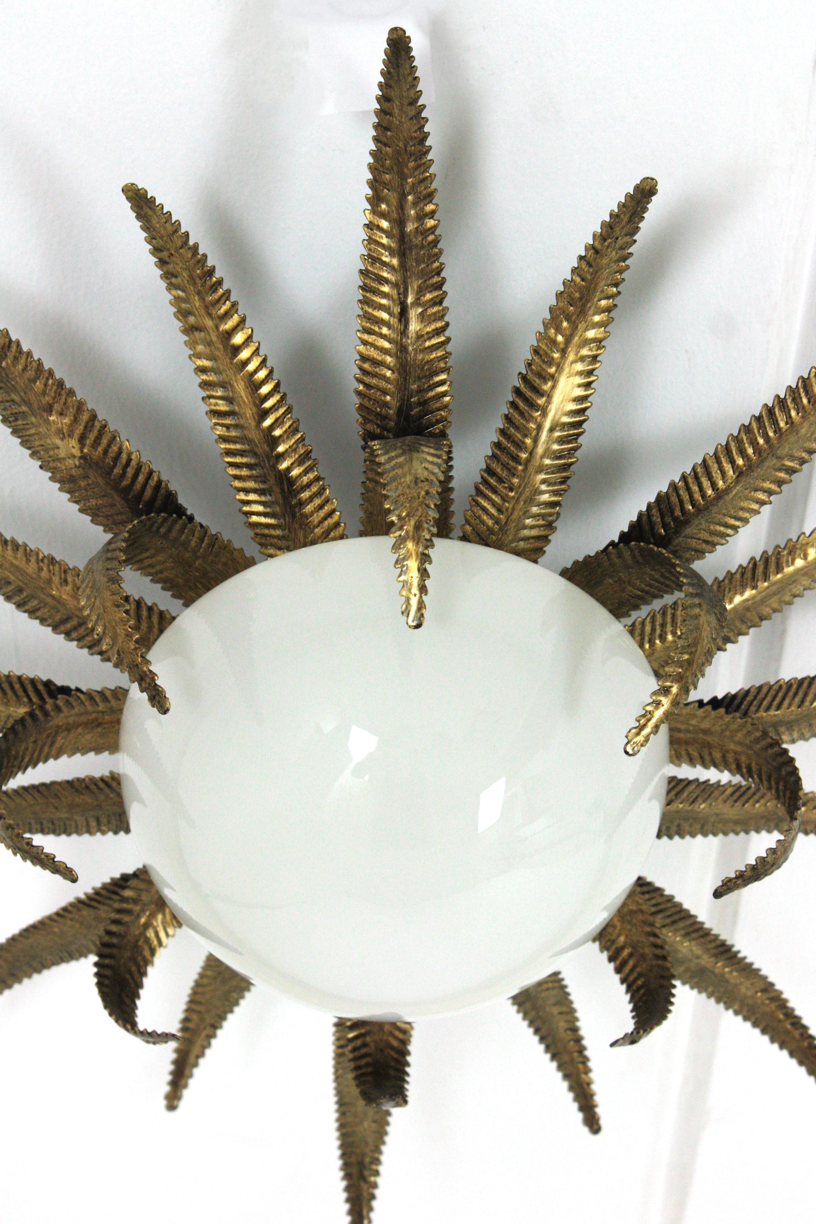 Large French Sunburst Starburst Light Fixture, Gilt Metal and Milk Glass In Good Condition For Sale In Barcelona, ES