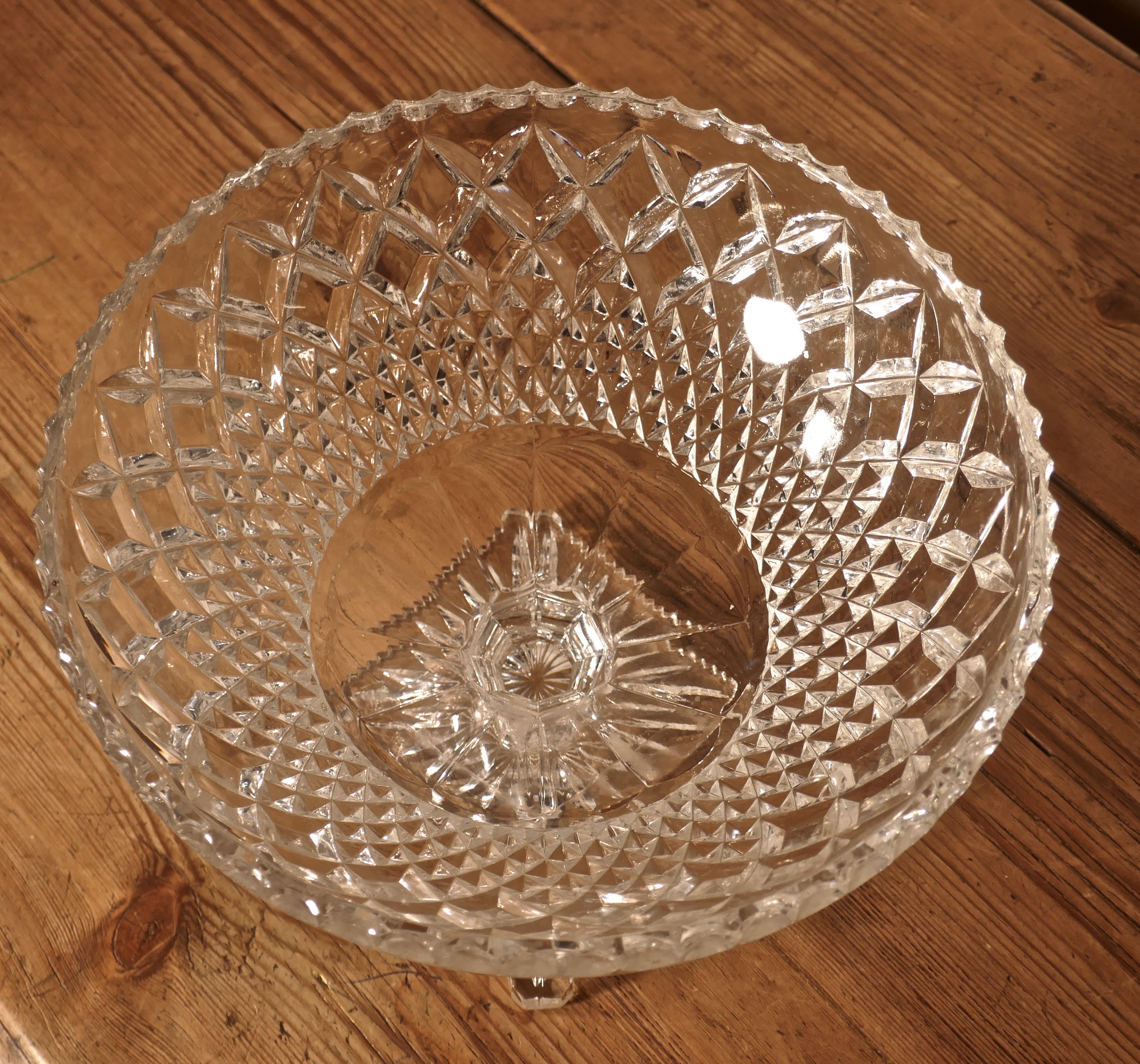 Large French Tazza diamond cut crystal pedestal fruit dish

A beautiful piece of diamond cut crystal, the large dish stands on a heavy stepped square base, this piece is in very good condition no scratches or marks
The dish is 8” tall and 10” in