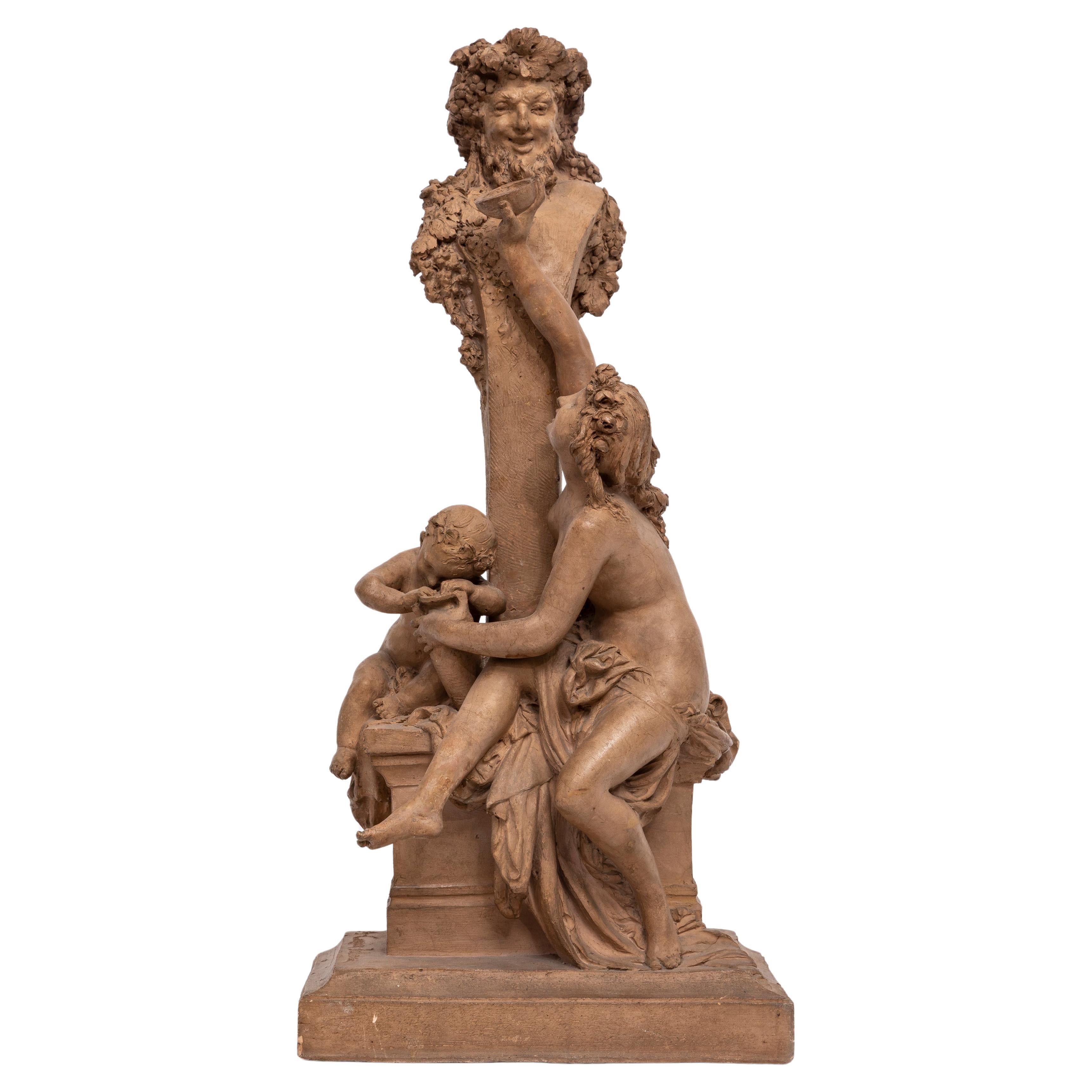 Grande figure française en terre cuite représentant Bacchus et une belle, signée Albert Ernest Carrier-Belleuse. Cette sculpture en terre cuite est une représentation de l'œuvre de 1868 du sculpteur français Albert Ernest Carrier-Belleuse, intitulée