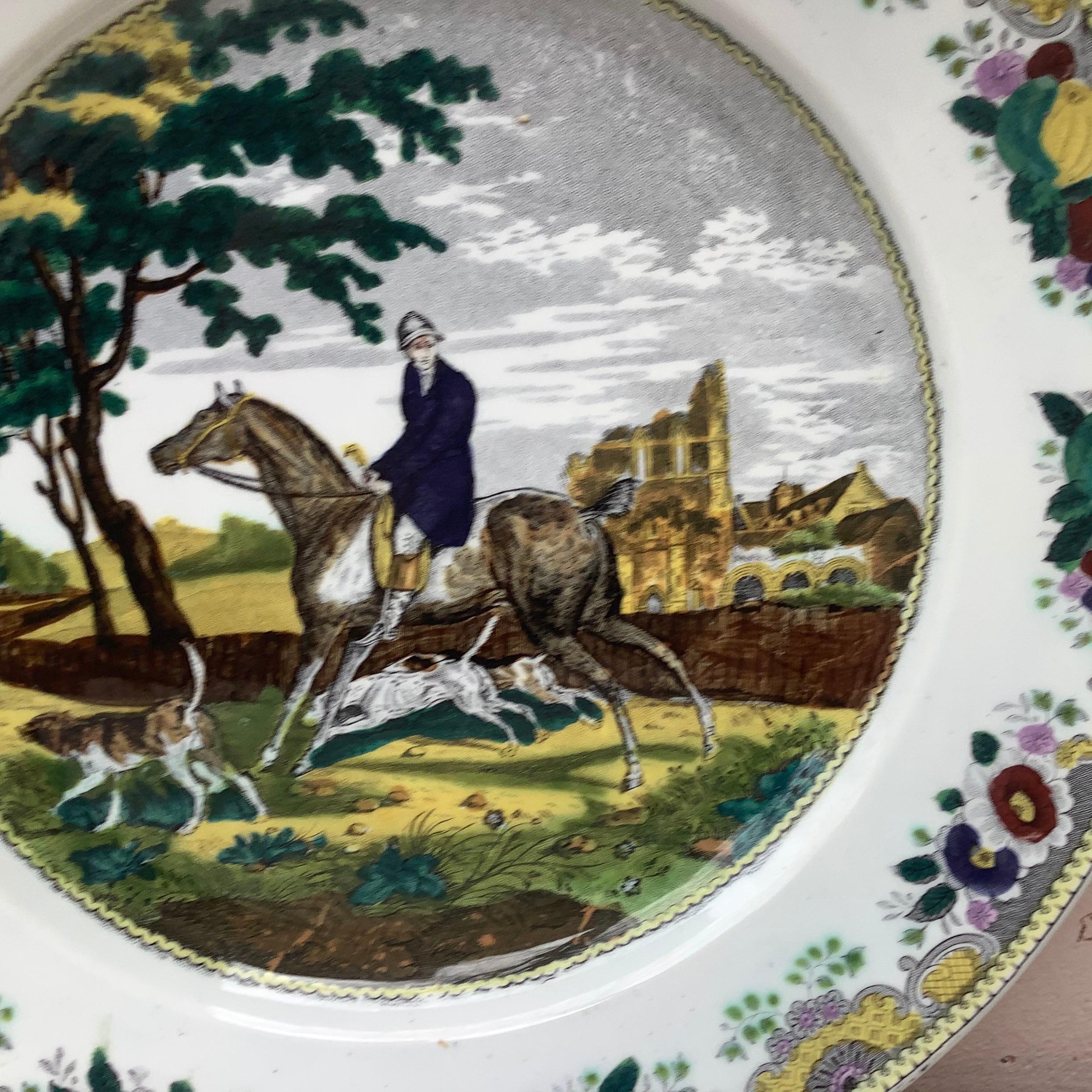 Early French polychrome transferware platter with hunt scene horseman and his dogs signed Hippolyte Boulenger for the manufacture of Choisy le roi, circa 1840.
The platter edge area is decorated with fruits and flowers.
 