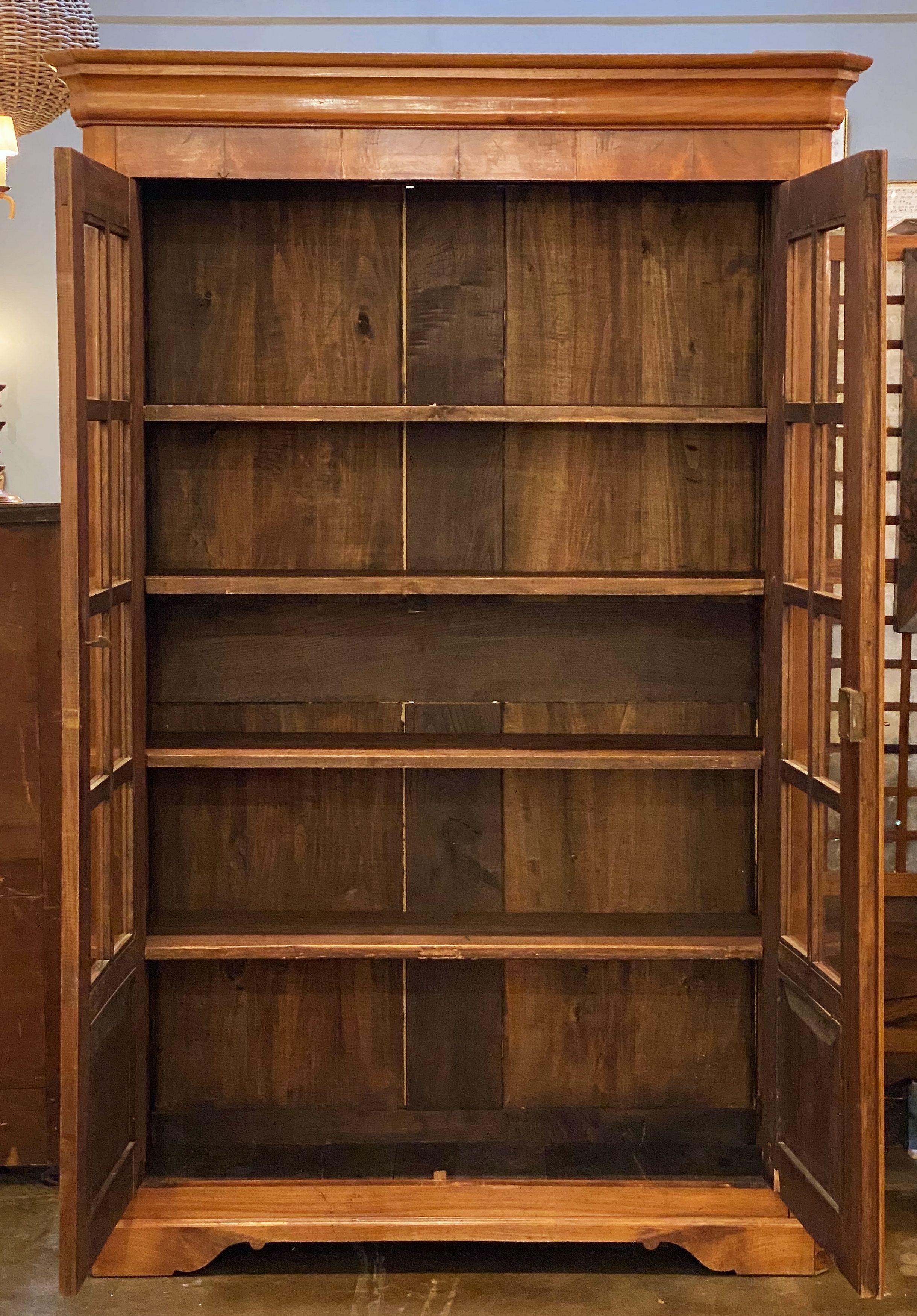 double bookcase with cabinet
