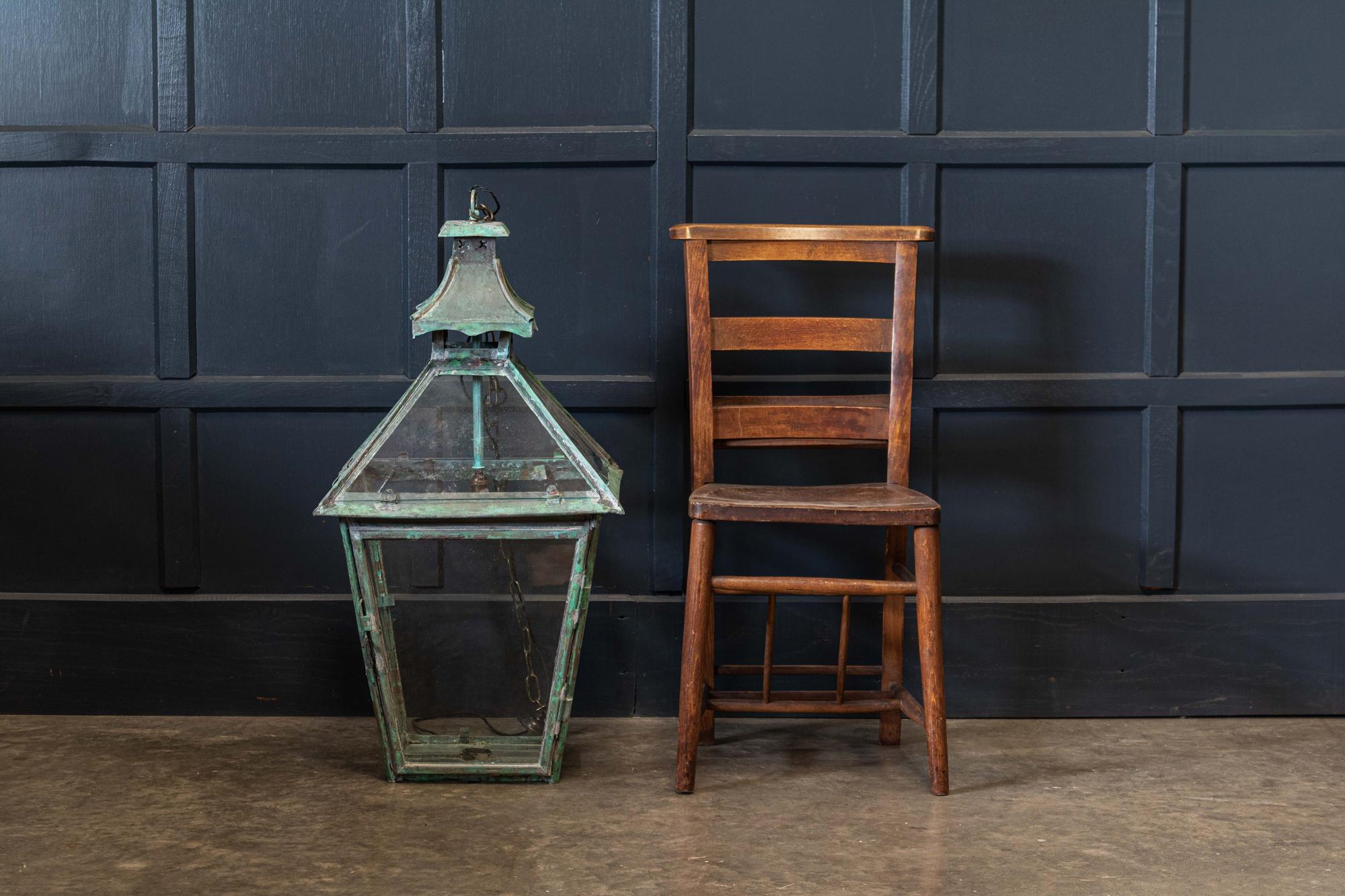 Circa 1880.

Large French verdigris copper lantern
With pergoda top and hinged front door. Comes with 1m of silk flex, 1m of heavy gauge antique brass chain & bronze ceiling hook.
Re-glazed rewired & pat tested - ready to hang.

  
