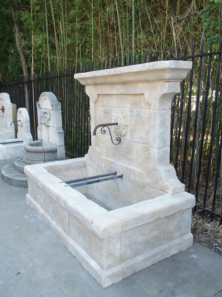 Large French Wall Fountain in Carved Provence Limestone at 1stDibs