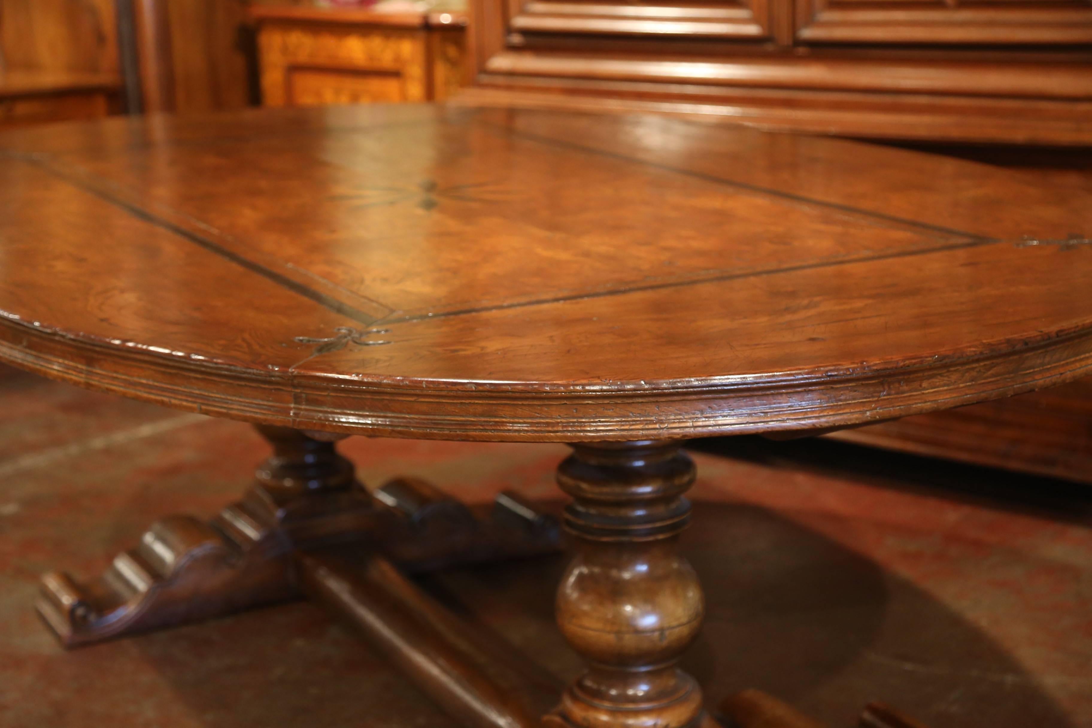 Late 20th Century French Walnut and Chestnut Oval Trestle Dining Room Table with Inlay Decor