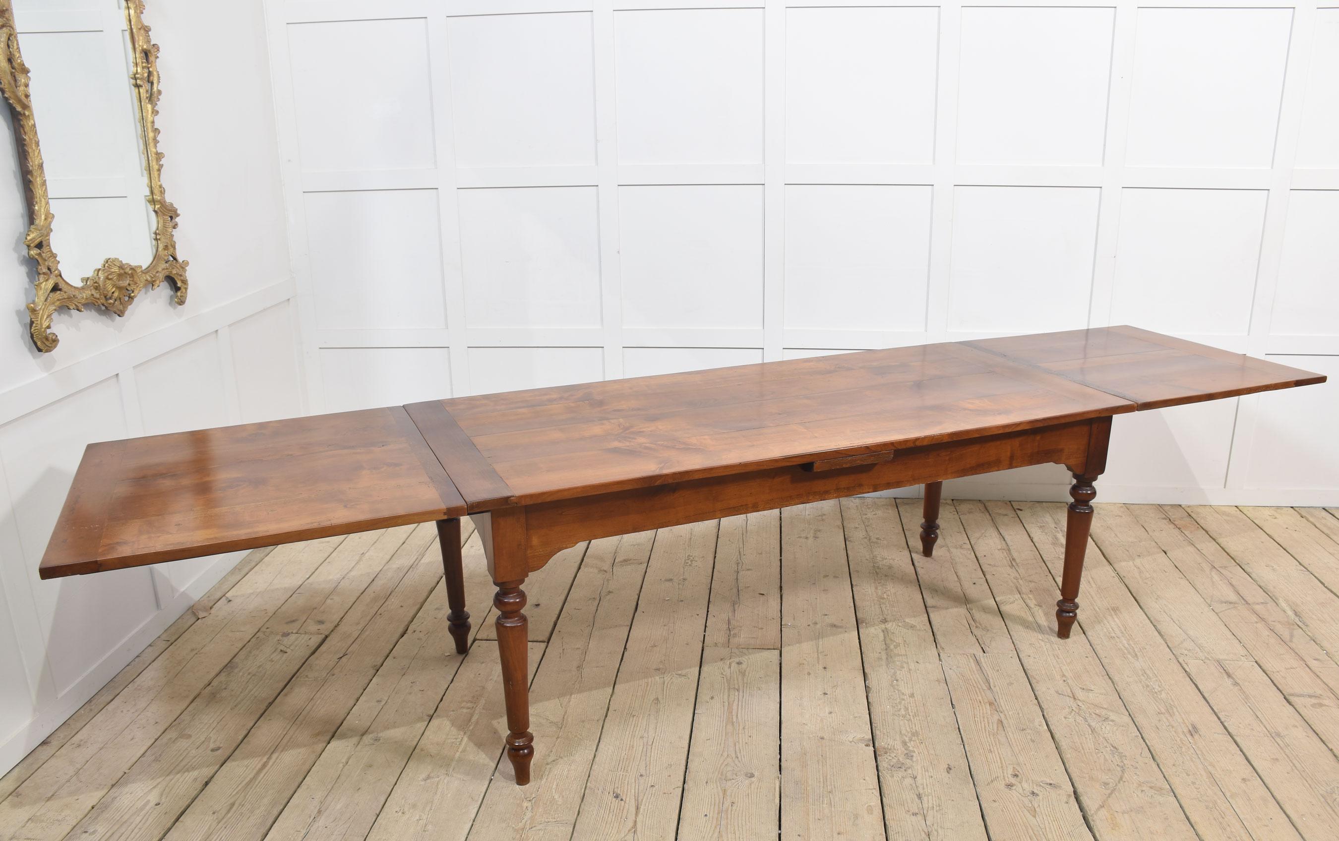 Very large farmhouse table. The rectangular top with pull out ends to the block freeze fitted with cheese slide all raised up on turned tapering legs. Will seat 12 people.
Dimensions
Height 29 Inches
Width 71 Inches when open 133 Inches
Depth 32.5