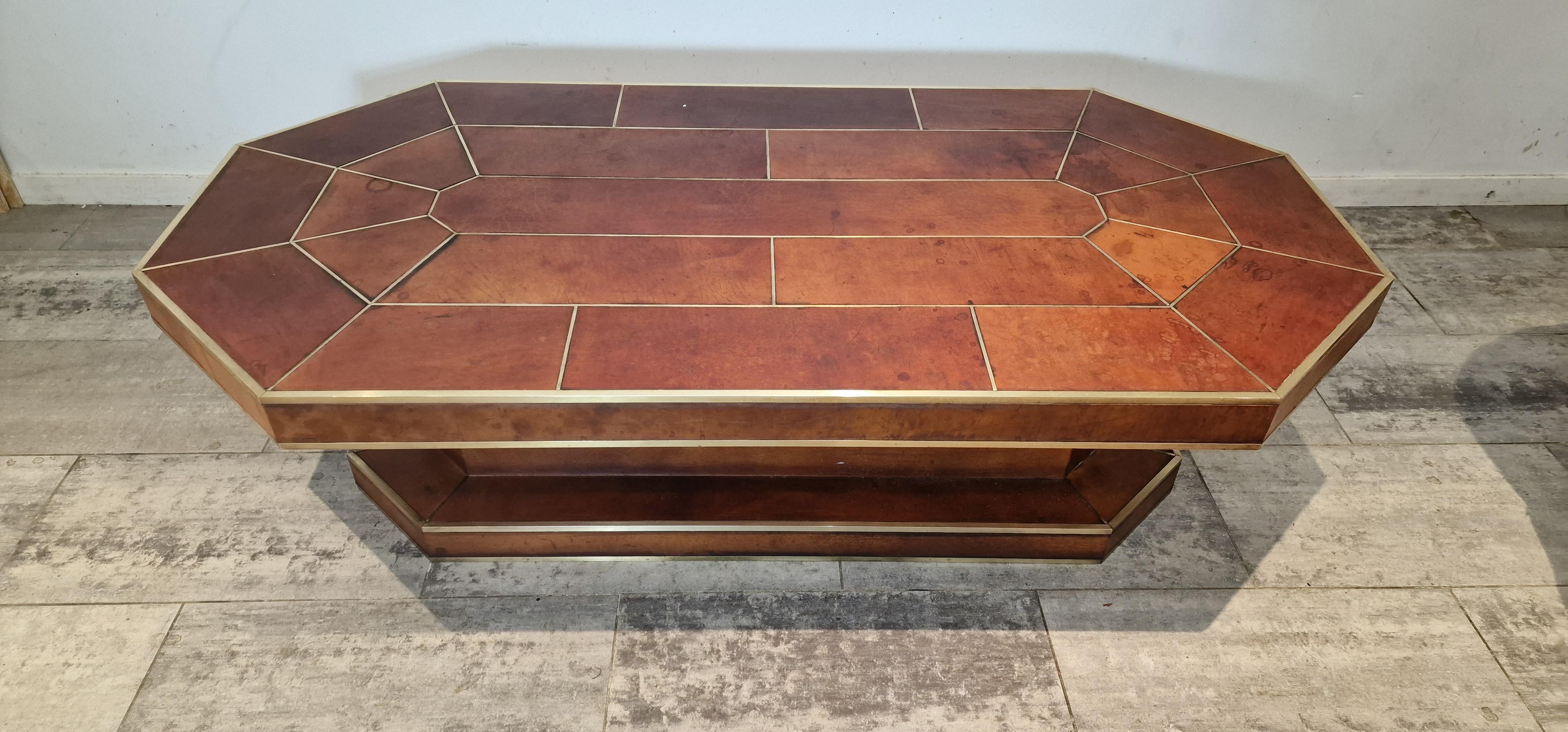 Large full leather brown coffee table with brass details from France.