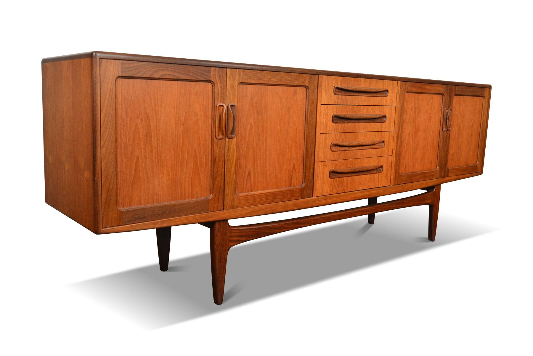 Origin: England
Designer: Victor B. Wilkins
Manufacturer: G Plan
Era: 1960s
Materials: Teak
Measurements: 84? wide x 18? deep x 31.5? tall

Condition: In excellent original condition with typical wear for its vintage. Price includes