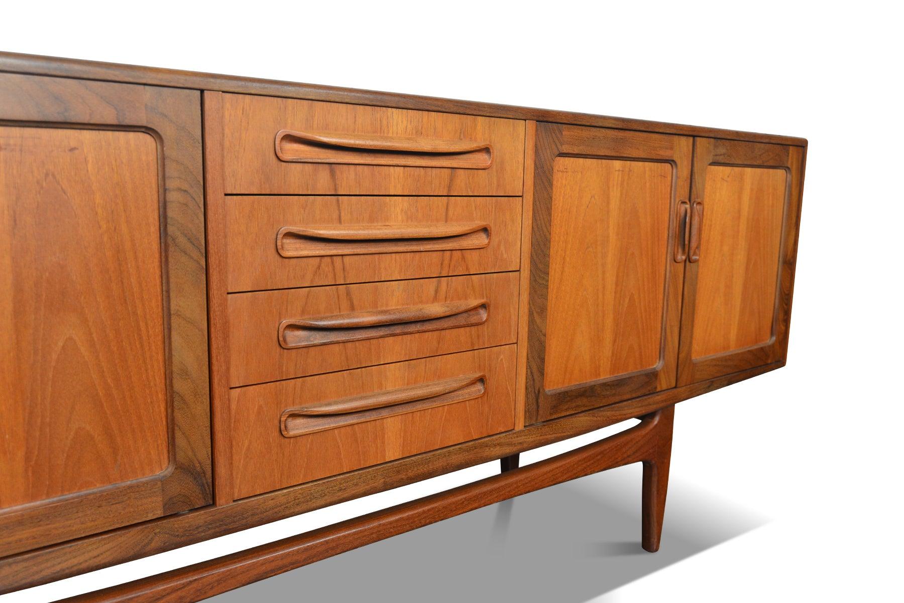 Origin: England
Designer: Victor B. Wilkins
Manufacturer: G Plan
Era: 1960s
Materials: Teak
Measurements: 84? wide x 18? deep x 31.5? tall

Condition: In excellent original condition with typical wear for its vintage. Price includes