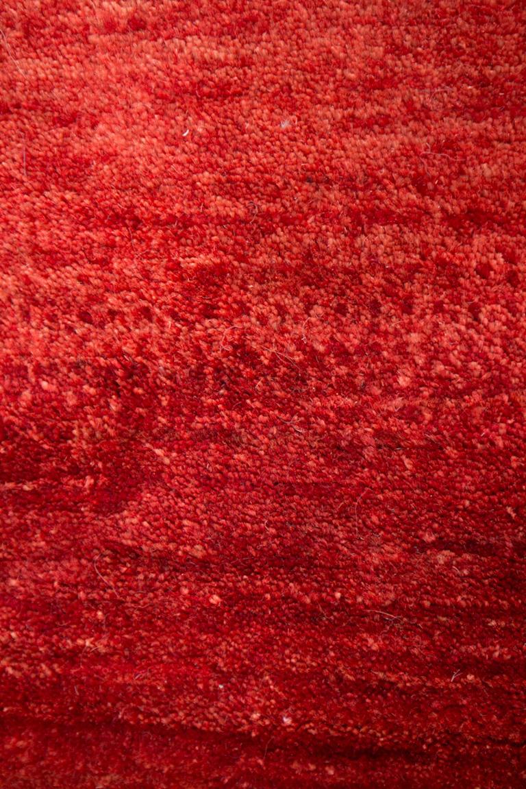 Large Cherry and Strawberry Red Contemporary Gabbeh Persian Wool Rug. In a word, radiant. This Gabbeh will cheer up any space with its bright cherry and strawberry reds (derived, in fact, from the outer skins of pomegranates). On the reverse side,