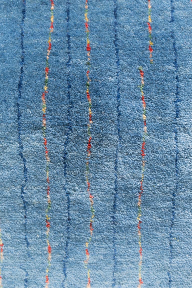 Large Denim Blue Contemporary Gabbeh Persian Wool Rug. Primary colors have never looked so cool: washed blue denim with the thinnest lines of yellow and red running through it like stitches. Anything goes with this fantastic and adaptable