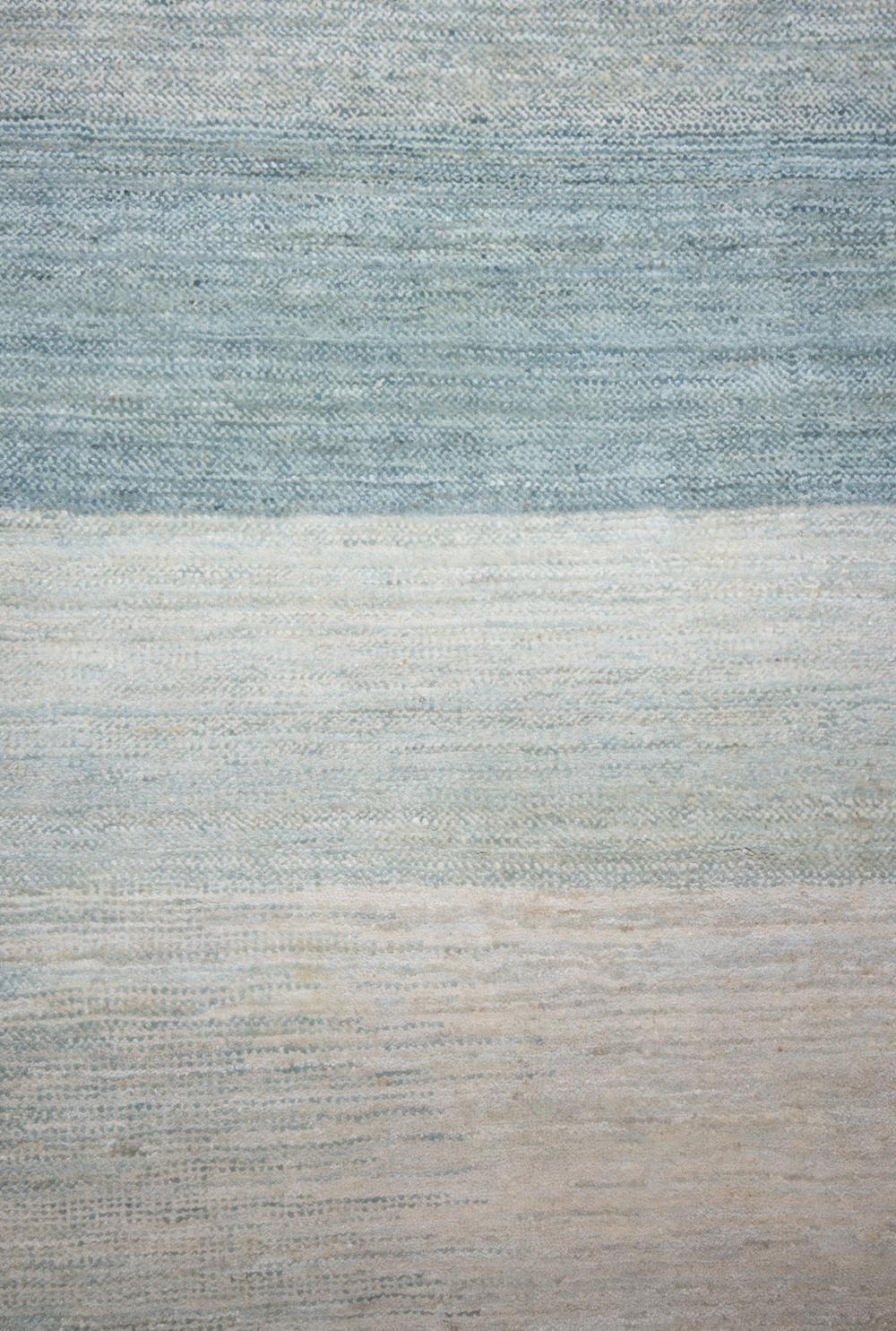 Large Blue and Jade Contemporary Gabbeh Style Persian Wool Rug. A composition of concentric, soft jade or seaglass greens, this gentle giant of a rug would be perfect in a bedroom or living room. The pale palette is similar to the backcountry waters