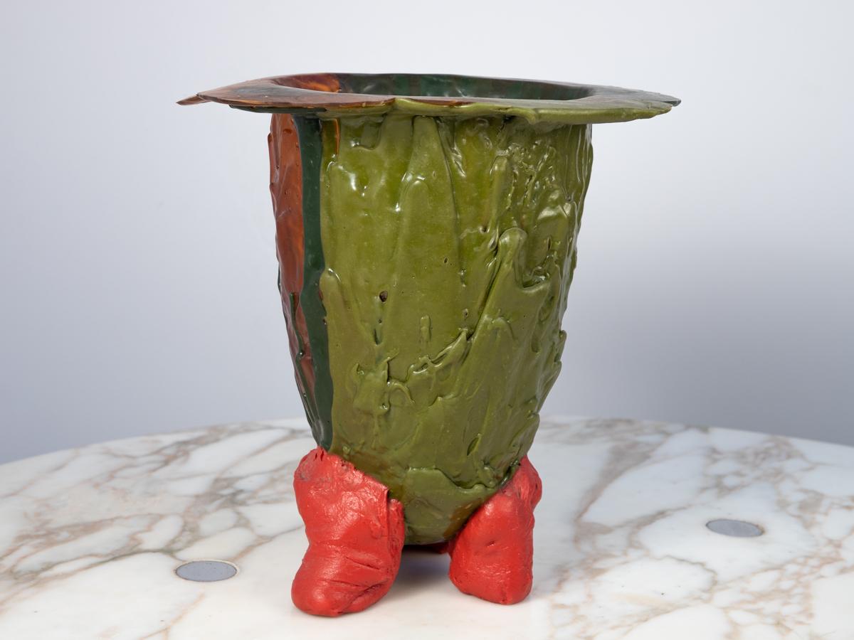 First edition Amazonia vase, designed by Gaetano Pesce for Fish Design. An impressive example for its large scale and striking colors. Molded in the designer's signature polychrome soft resin material in forest green, red and amber with a