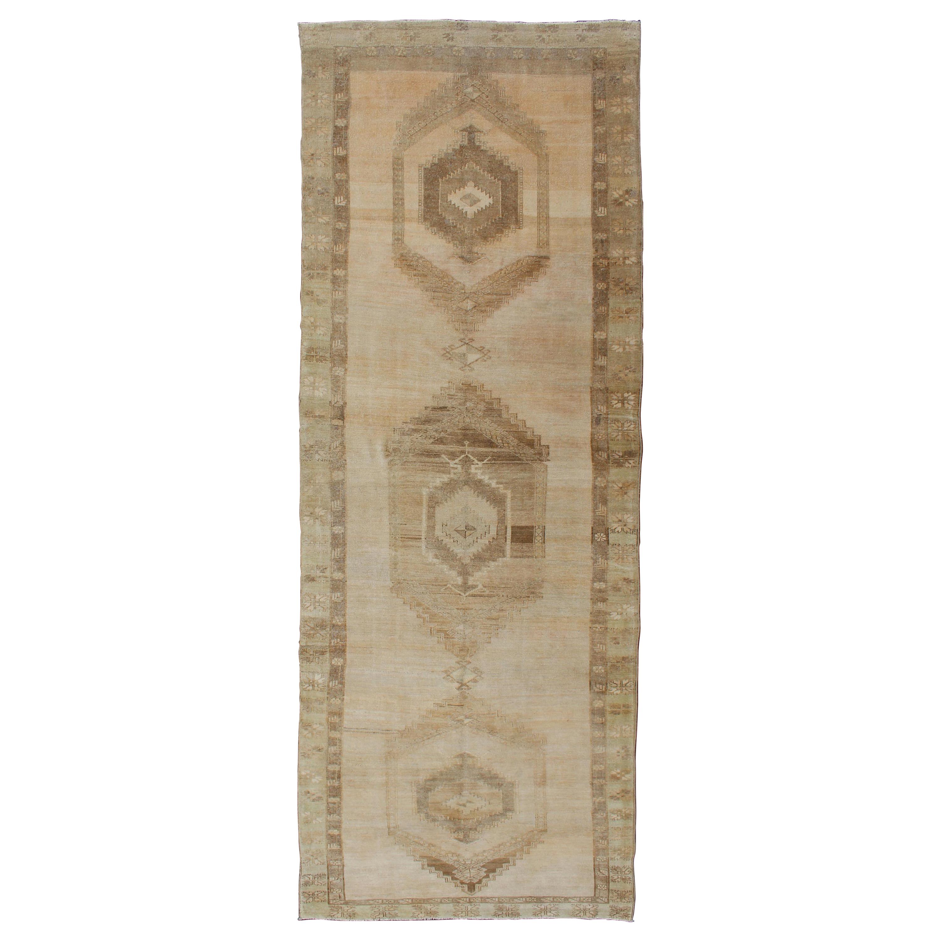 Large Gallery Runner Turkish Rug in Earth Tones & Light Brown in Medallions For Sale