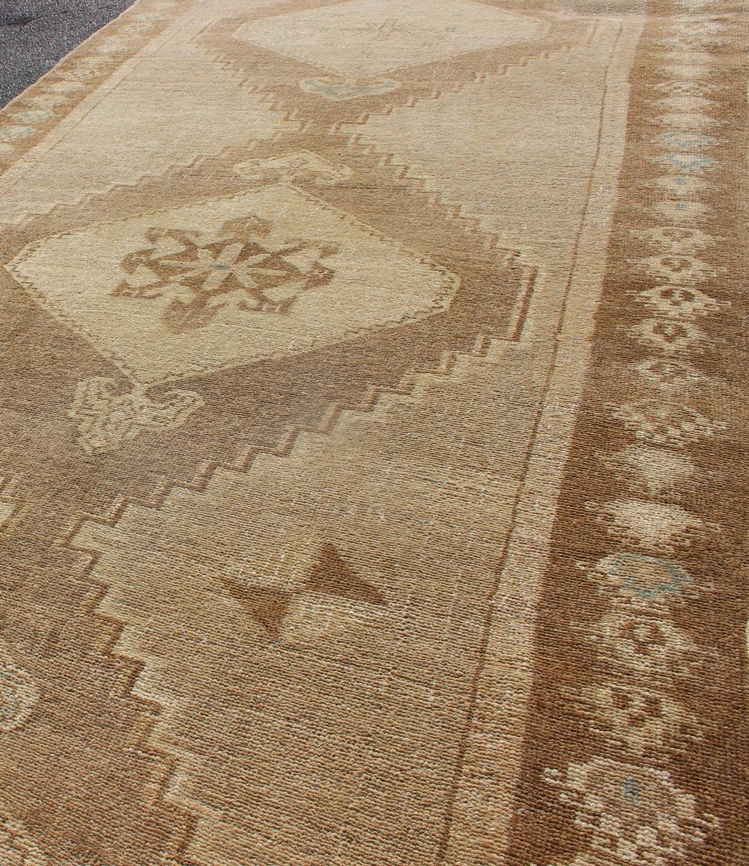 20th Century Large Gallery Turkish Rug in Earth Tones, Light Brown with Three Medallions For Sale