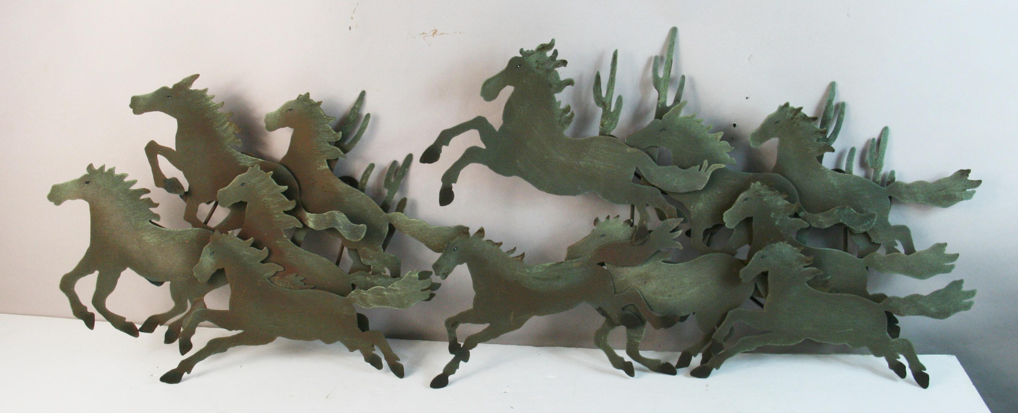 1852ab Oversized galloping horses wall sculpture.
The sculpture is made up two seperate sculptures
#1 18x15x3,25 inches
#2 24x 15x 3,25 inches