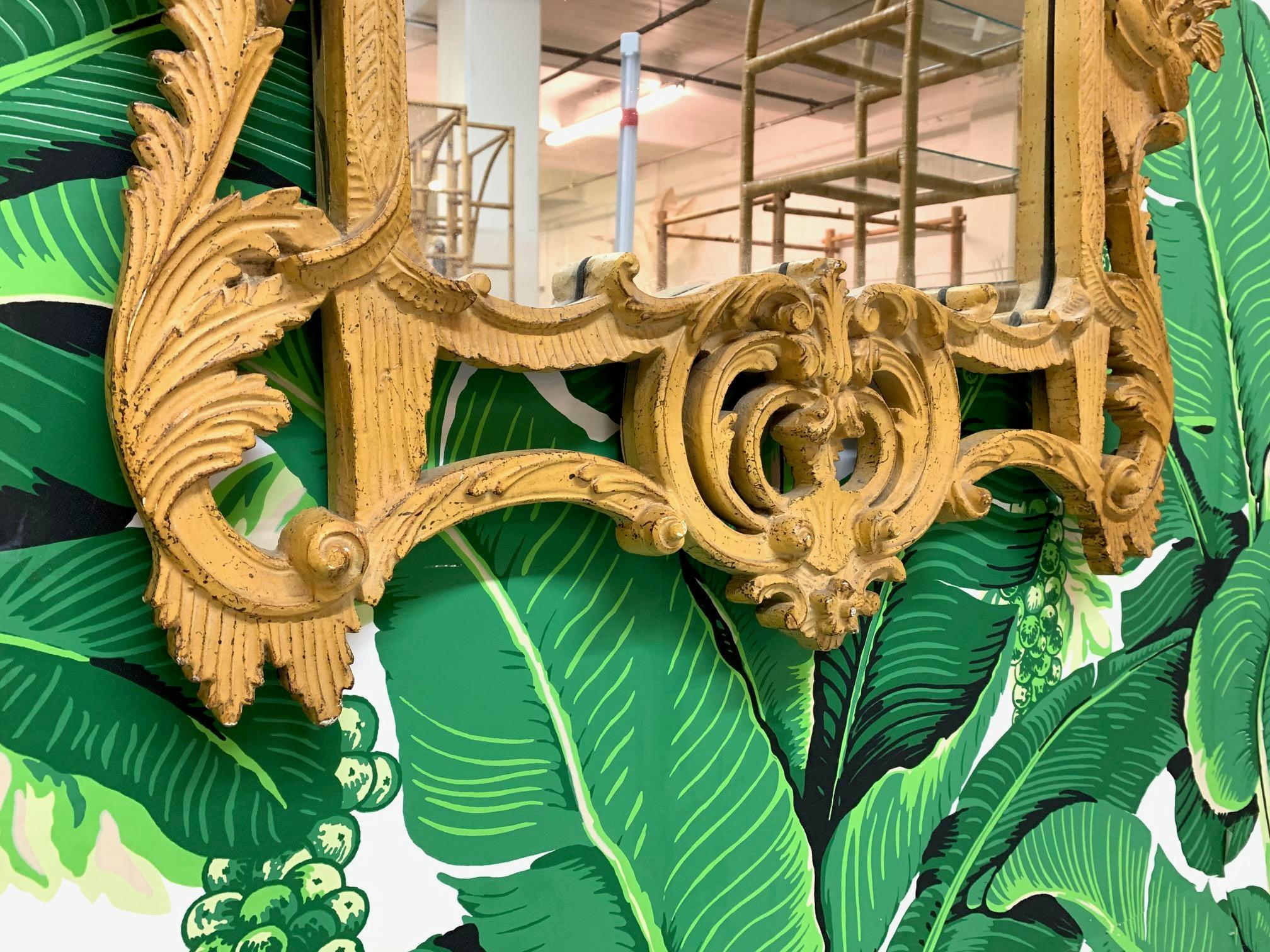 Large pagoda style wall mirror by Gampel Stoll offers any decor a touch of Asian chinoiserie style. Carved wood and heavy wood backing. Very good condition with only very minor imperfections consistent with age.