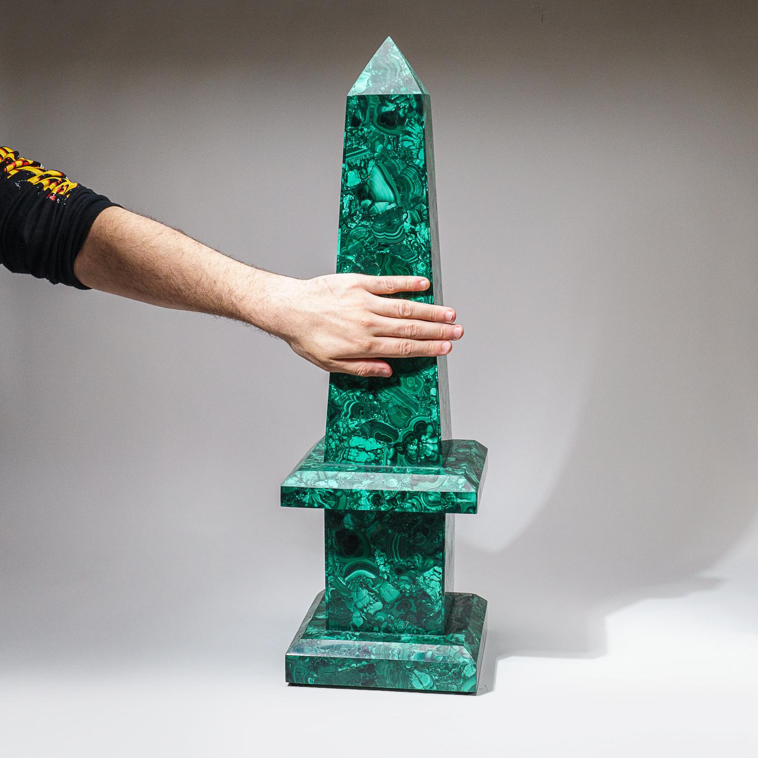 Handcrafted to perfection, this obelisk was made from AAA quality natural Malachite. Malachite is the essence of joy and is known as the 