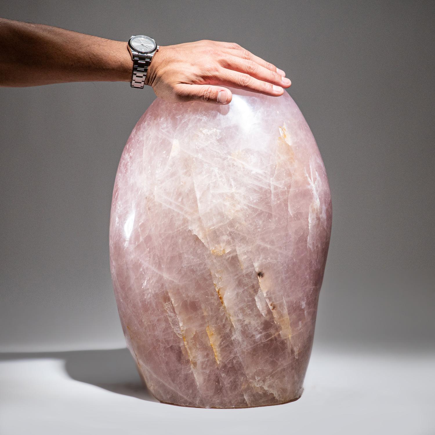 This massive, 102 pound, hand-polished, AAA-quality Rose Quartz freeform from Madagascar is incredibly crafted from one solid piece of Rose Quartz. This beautiful freeform is the focal point in any room. Rose Quartz is the stone of unconditional