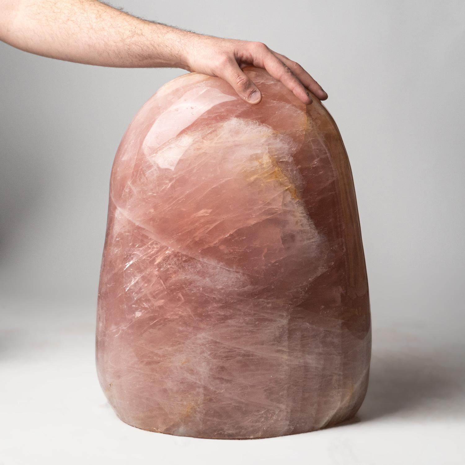 This massive, 133 pound, hand-polished, AAA-quality Rose Quartz freeform from Madagascar is incredibly crafted from one solid piece of Rose Quartz. This beautiful freeform is the focal point in any room. Rose Quartz is the stone of unconditional