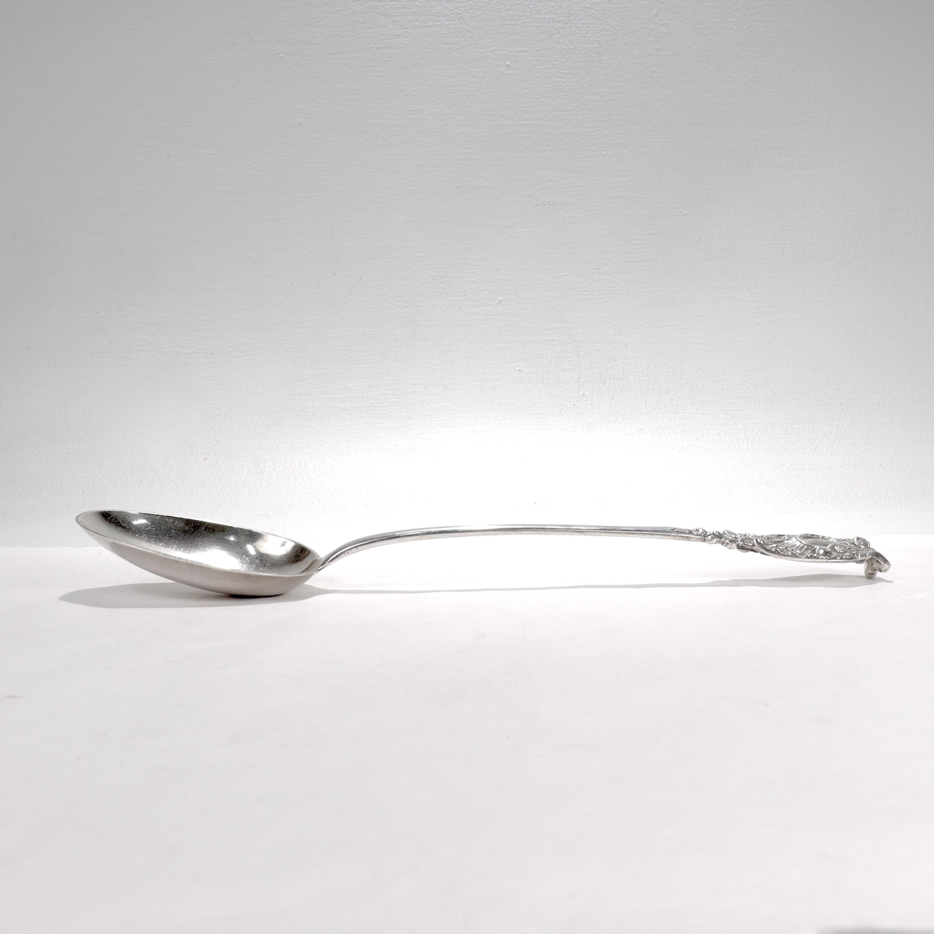 Large George III Robert Garrard I English Sterling Silver Crested Stuffing Spoon In Good Condition For Sale In Philadelphia, PA