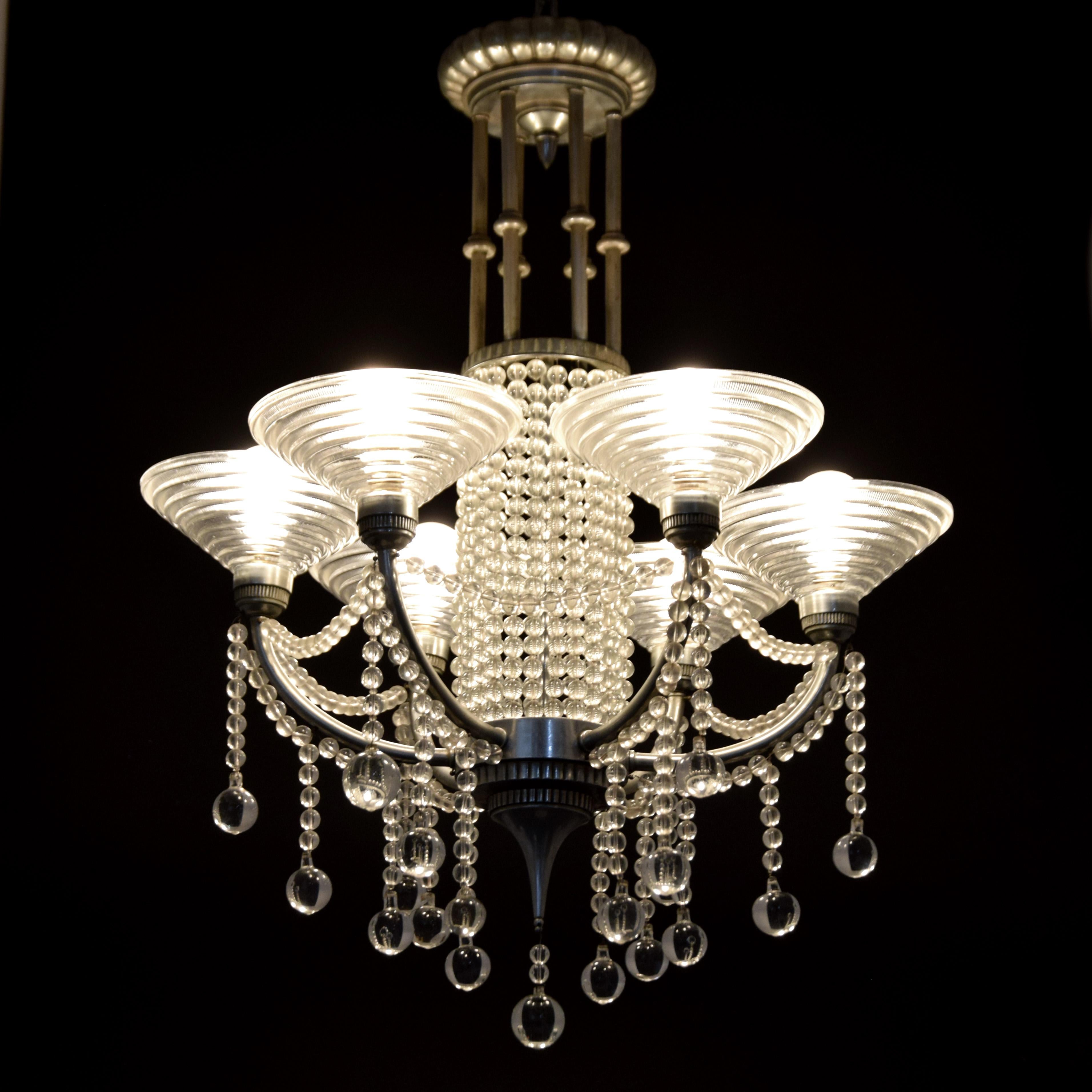 Artistics/Designer ; Fabricant : Georges Leleu
Marquage(s) ; notes : signé
Pays d'origine ; matériaux : France ; métal, verre
Dimensions (H, L, DIAS) : ensemble : 44 
