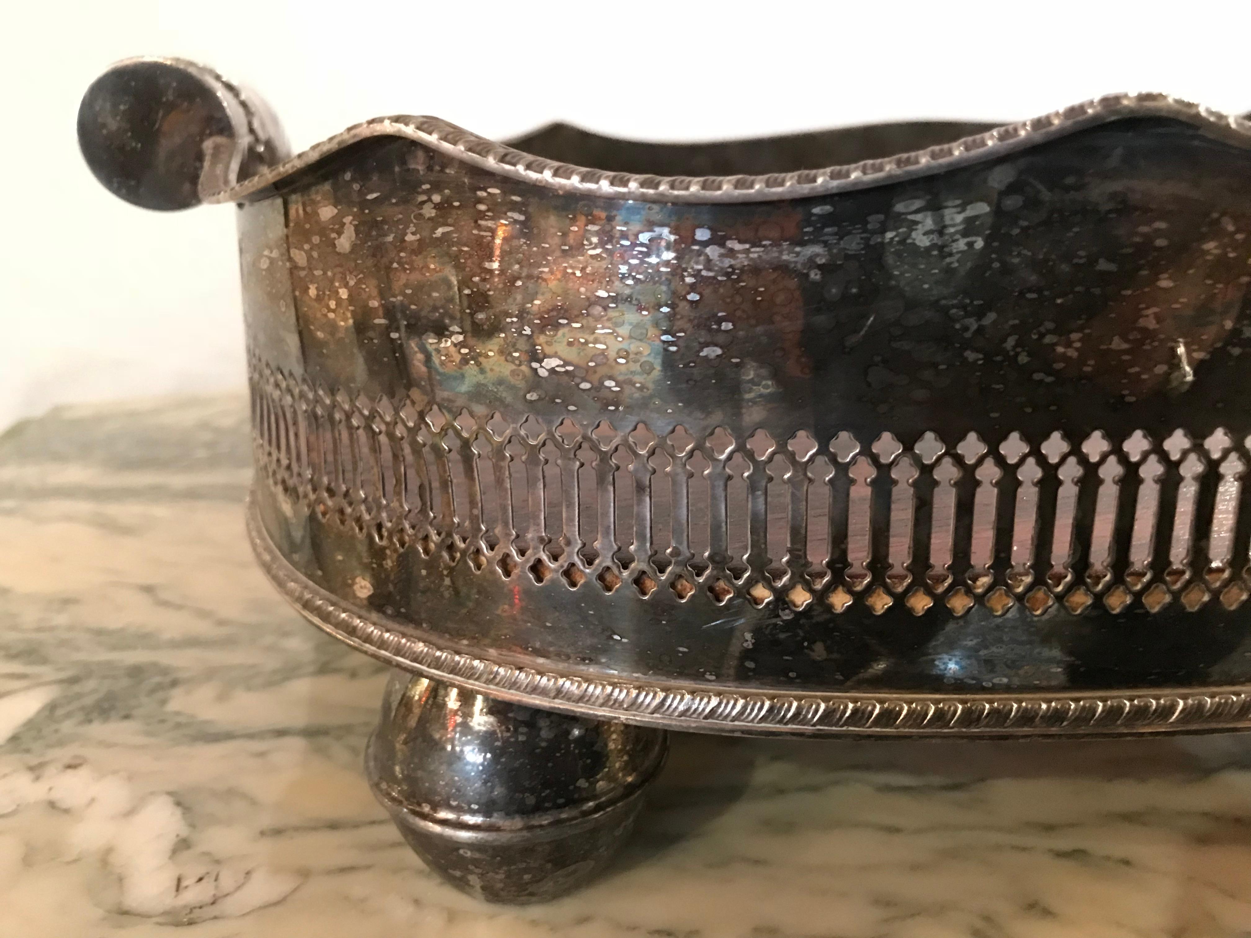 A very large silver plate rosewood serving tray, 19th-20th century. This palatial silver plated serving tray is one of over fifty recently acquired from a New Jersey Antique shop that I purchased. The rosewood centre mounted in a finely chased