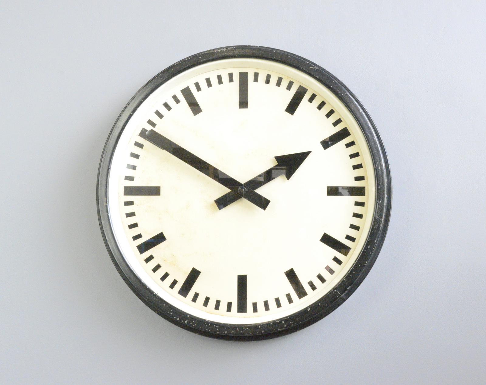Large German Factory clock, Circa 1950s

- Stepped black steel casing
- Steel dial and glass face
- Original arrow hands
- New AA battery powered quartz motor
- German ~ 1950s
- 76cm wide x 11cm deep

Condition Report

Fully restored and
