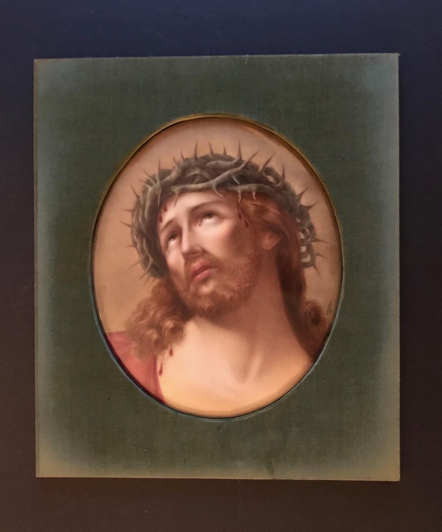 This is a superb portrait of Christ. It is hand painted in extraordinary quality with polychrome enamel on an oval porcelain plaque after the original painting -Head of Christ- by the Italian artist Guido Reni (1575-1642). The plaque is signed O.W.
