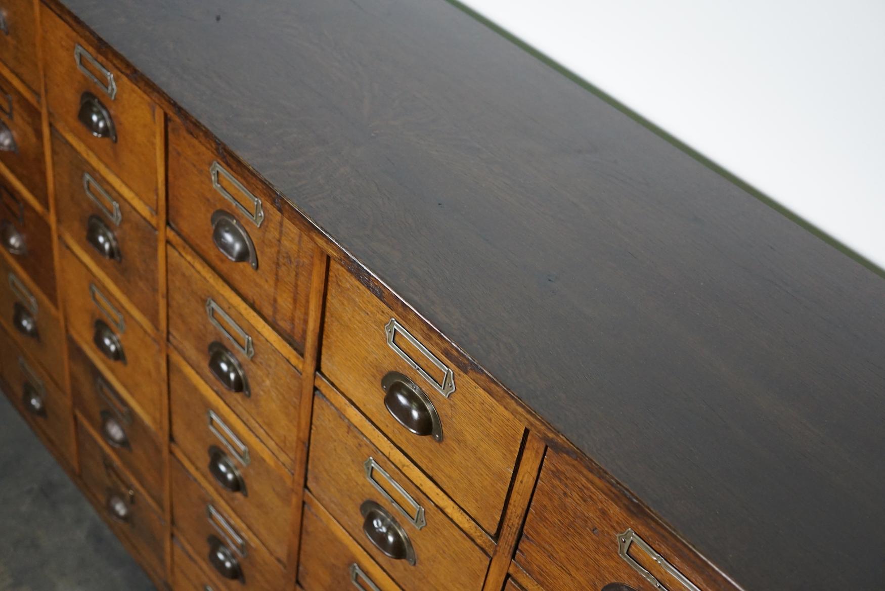 Large German Industrial Oak Apothecary Cabinet / Bank of Drawers, 1930s 11