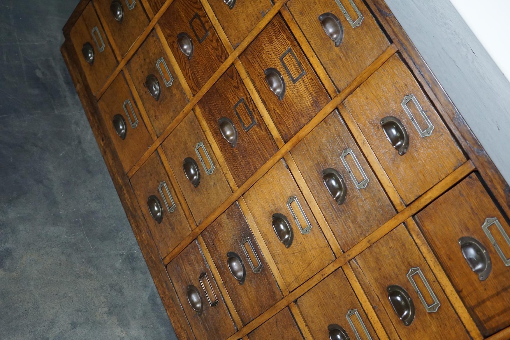Large German Industrial Oak Apothecary Cabinet / Bank of Drawers, 1930s 4