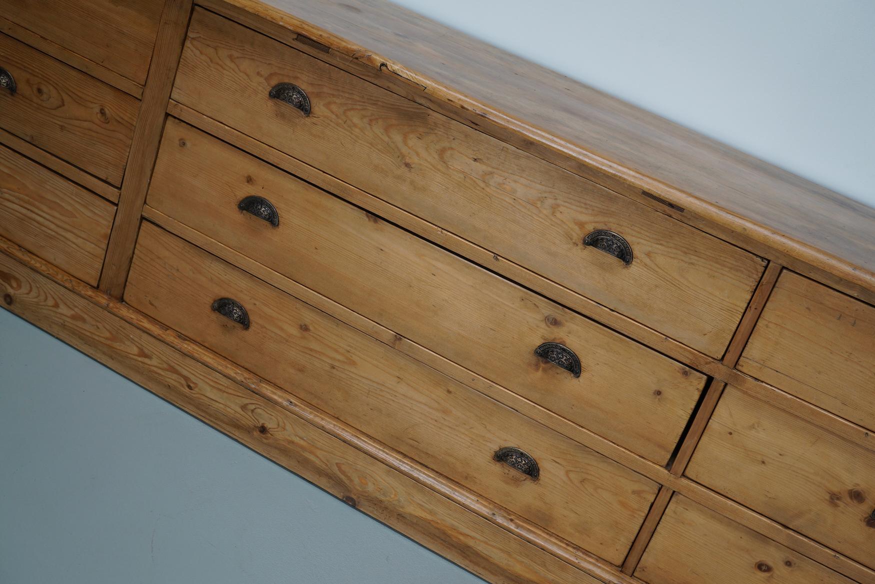 Large German Pine Apothecary Cabinet / Bank of Drawers, Early 20th Century For Sale 8