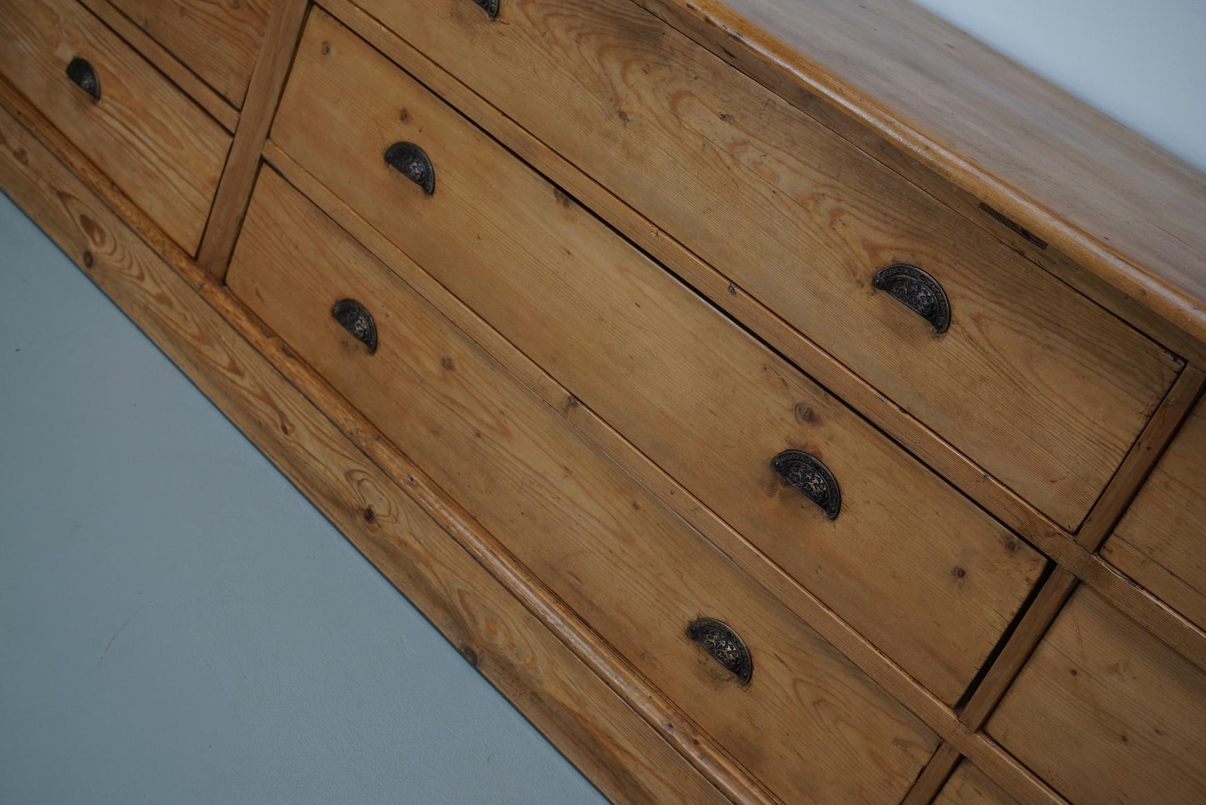 Industrial Large German Pine Apothecary Cabinet / Bank of Drawers, Early 20th Century For Sale