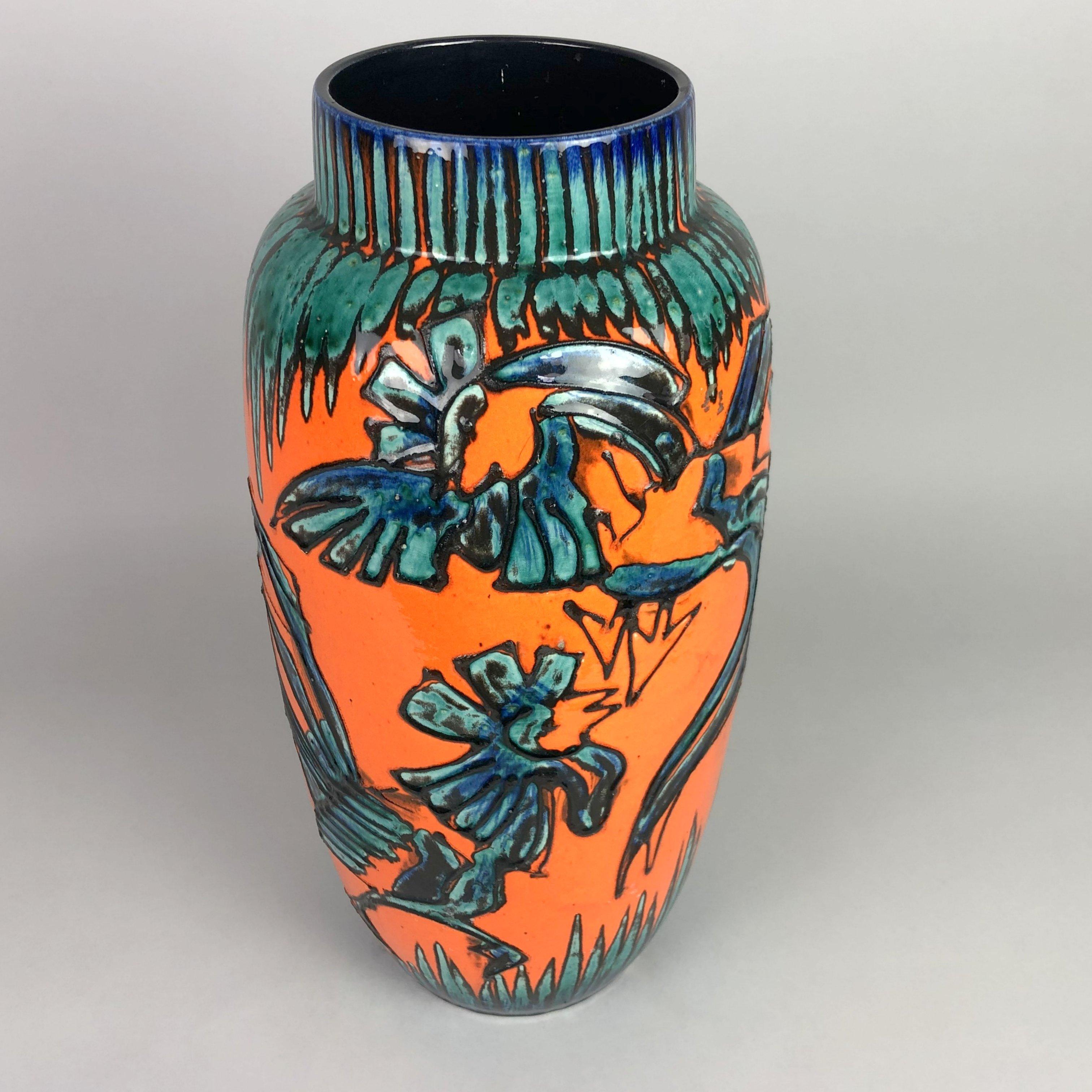 Gorgeous German vintage large floor vase from Scheurich Keramik, decorated with orange and green fat lava glaze - rooster. Marked with number 553-52. Overall in a very good condition, except one little chip at the very bottom of the vase (see photo).