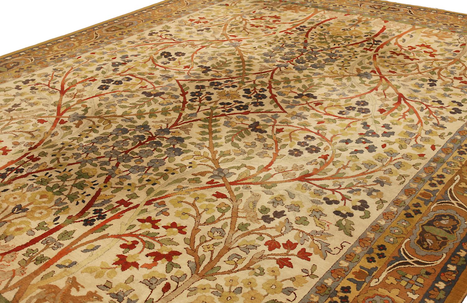 This is an antique German Tetex carpet woven during the first quarter of the 20th century circa the 1920s and measures 400x 293 CM in size. This carpet has an all-over floral design with blossoming trees protruding from both ends and meeting in the