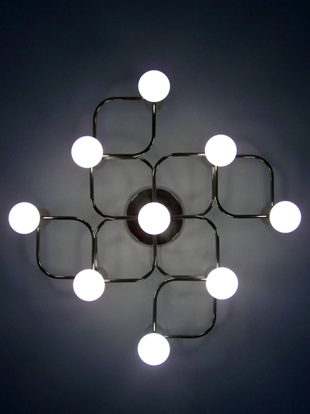 One of... large sculptural Sciolari style ceiling or wall flushmount by Leola.
Germany, 1960s.
  