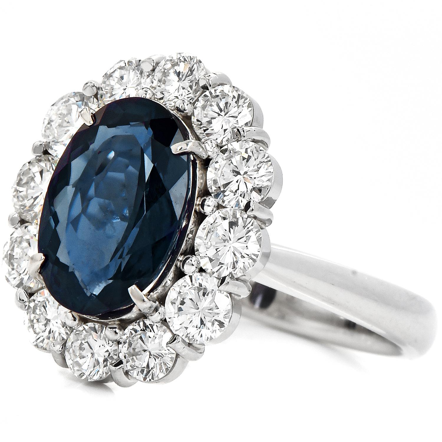 A Halo flower-inspired Cocktail ring, with romance and mystery.

This Lady Diana Style ring is Crafted in solid Platinum 900.

This Classic ring is centered with a Genuine GIA Certified Color Changing Brizil origin Rare Alexandrite, Oval Cut, Prong
