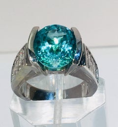 Large GIA Certified Oval Paraiba Tourmaline and Diamond 18 Karat White Gold Ring