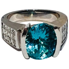 Large GIA Certified Oval Paraiba Tourmaline and Diamond 18 Karat White Gold Ring