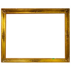 Grande cornice dorata e decorata con stucchi del 1800