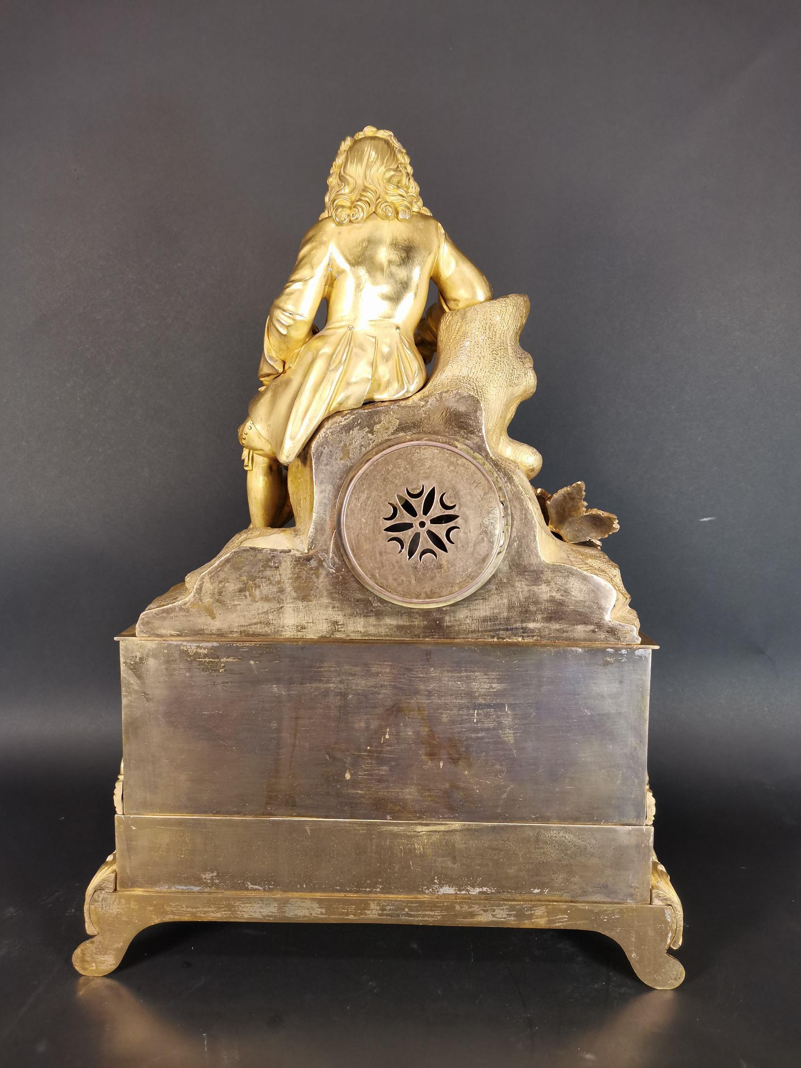 Large gilded bronze clock with Louis XIV figure.
Mechanism working with a pendulum and original key
End 18th century beginning 19th century
Measures: 60cm x 55cm x 18cm
Very good condition.