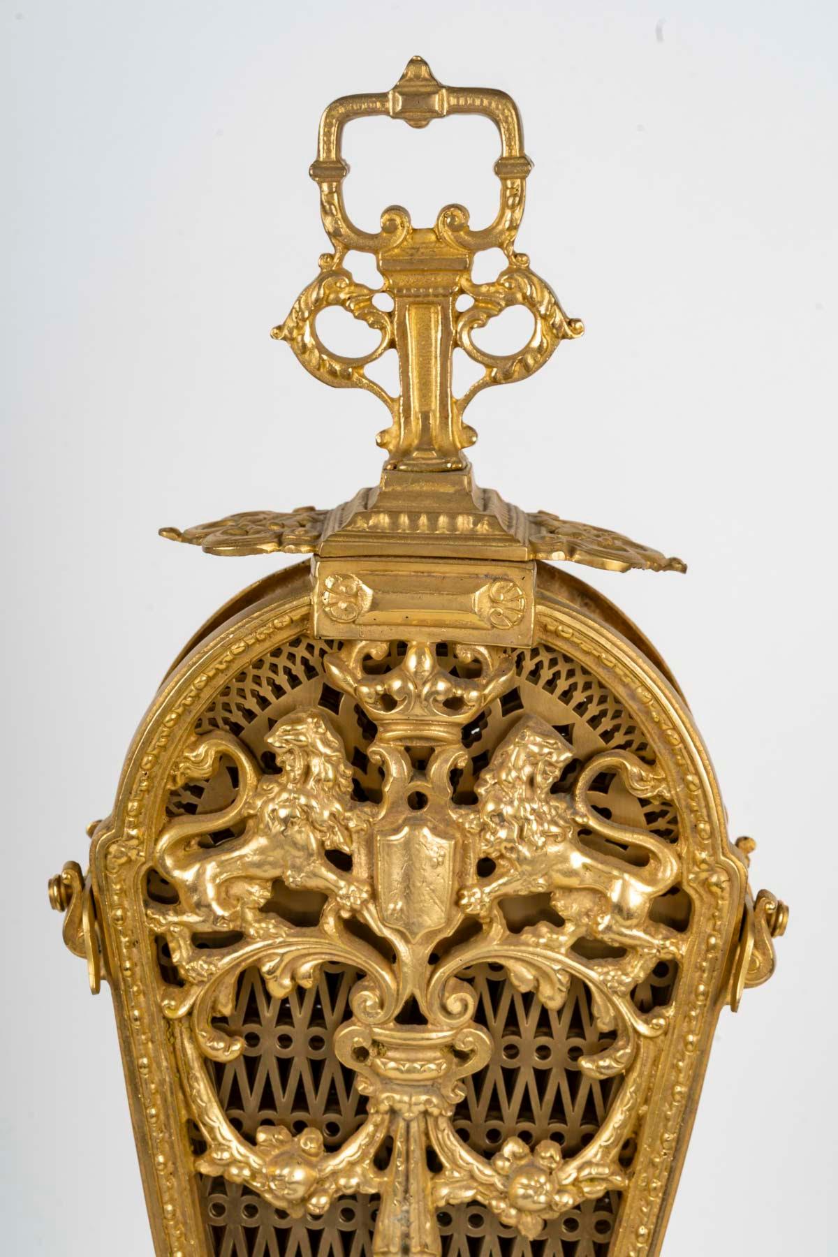 19th Century Large Gilded Bronze Fan-Shaped Fire Screen in the Louis XVI Style.