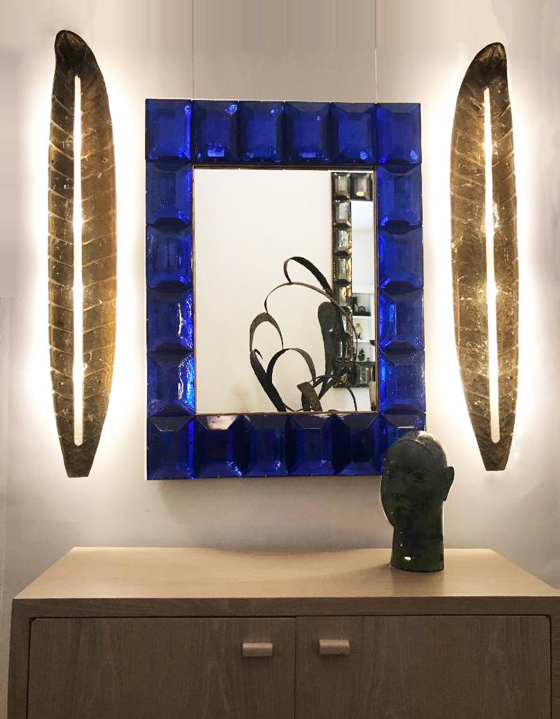 Pair of large palm leaf form Murano glass wall light
Gilded glass
Spectacular warm beam of light
Wired to the American standard.
Located in our store in Miami ready for shipping.

