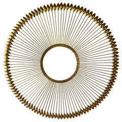 Large Gilded Metal Arrow Motif Round Wall Sculpture
