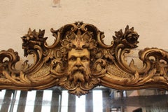Large Gilded Napoleon III Mirror With A Mask Motif
