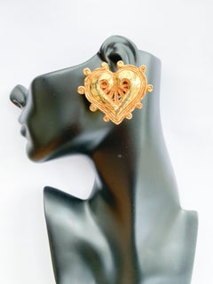 Large gilded resin 'heart' shaped earrings, Christian Lacroix, France, 1980s.